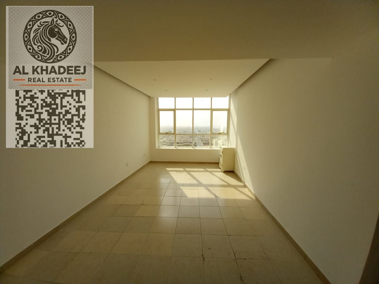 2BR apartment in Garden City – Al Almond 5, 1132 sq ft, balcony, parking, near Ajman University. Price AED 390,000 cash.