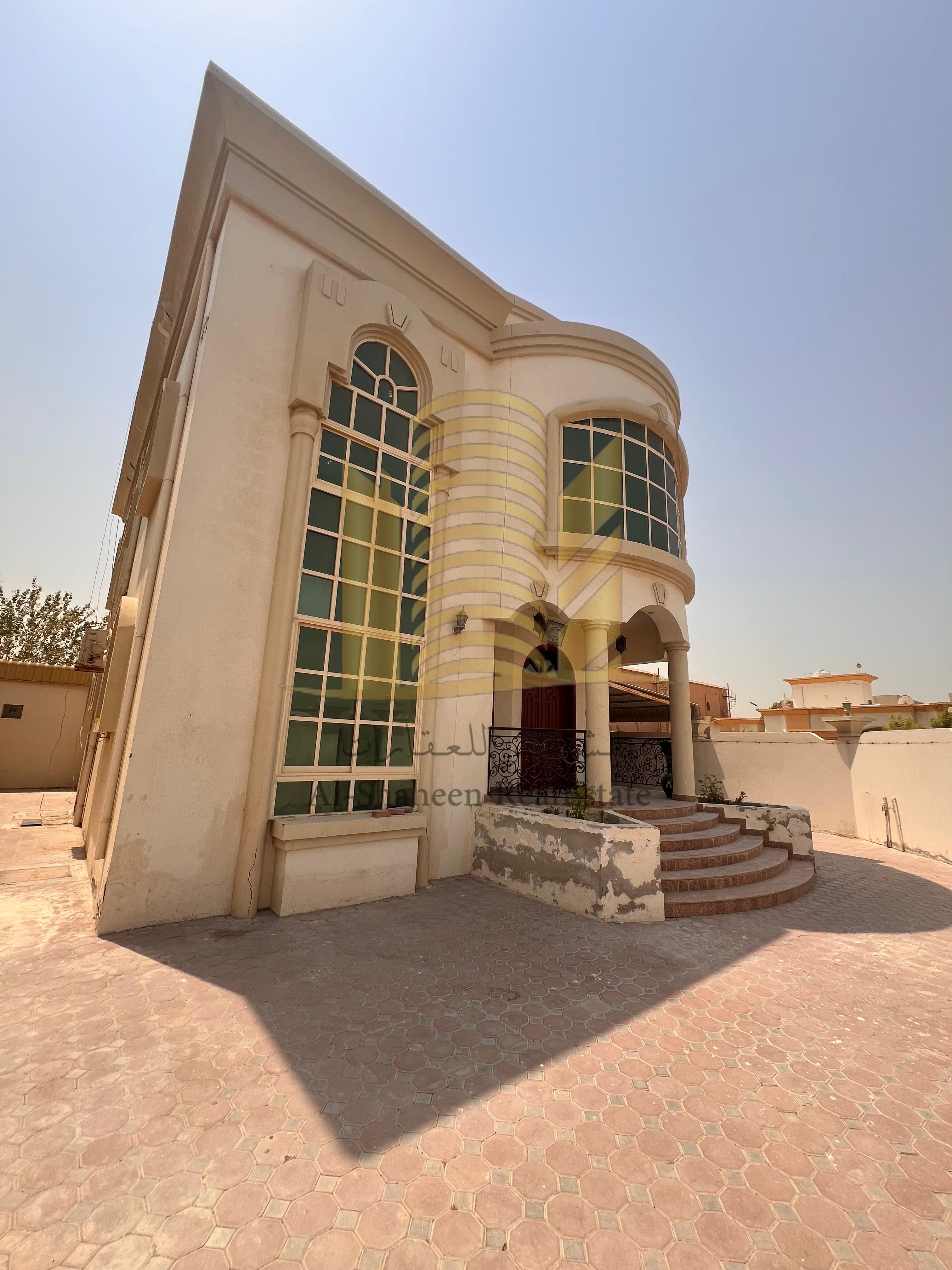 Corner villa in Al Rawda 3, annual rent, 5 master bedrooms, living room and majlis