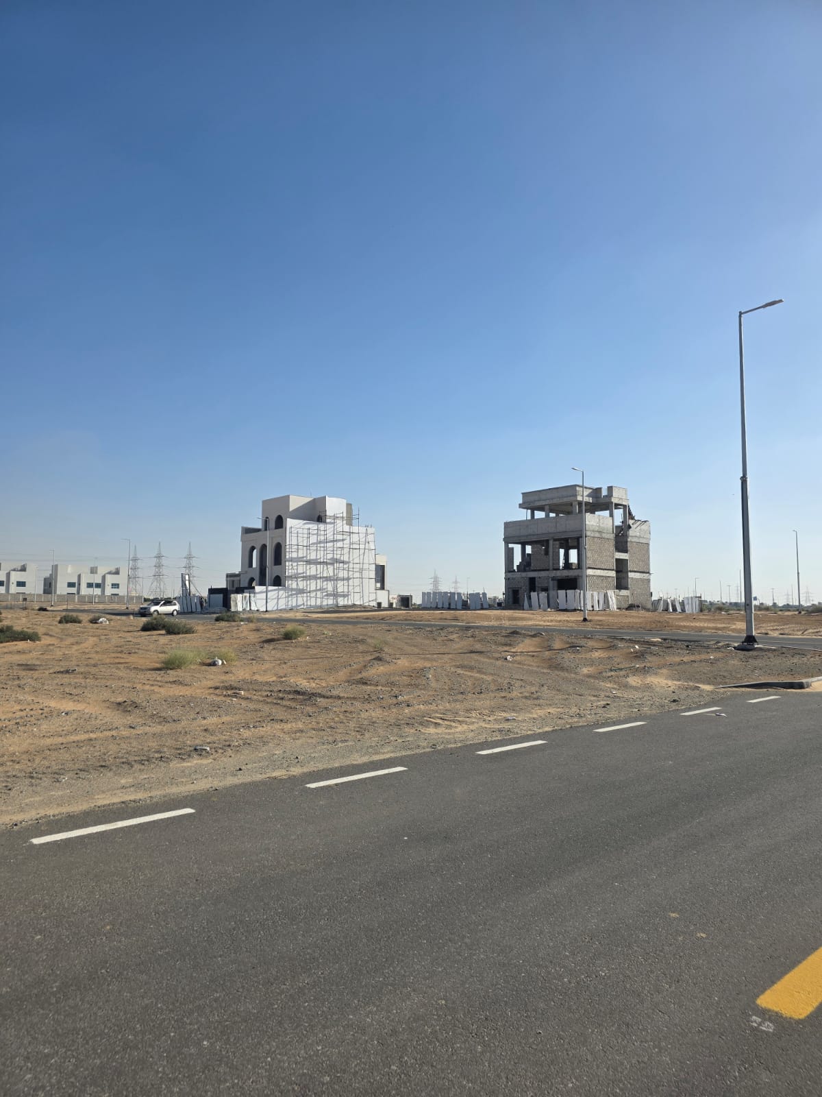 Commercial land for sale in Rawdat Al Qurt area, Al Ruwaidat suburb
