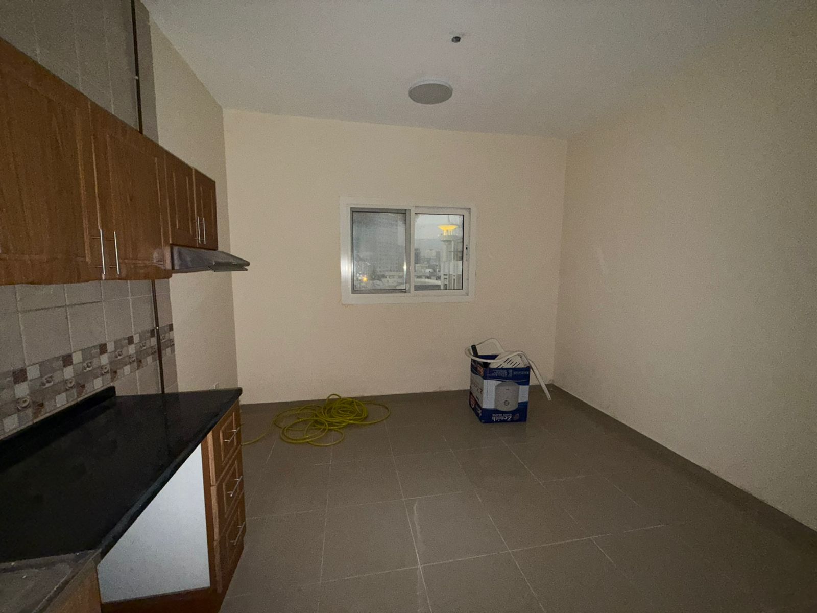 External parking, free maintenance & cleaning, flexible payments, spacious studio with fitted kitchen cabinets, open view, easy Dubai exit access, clo
