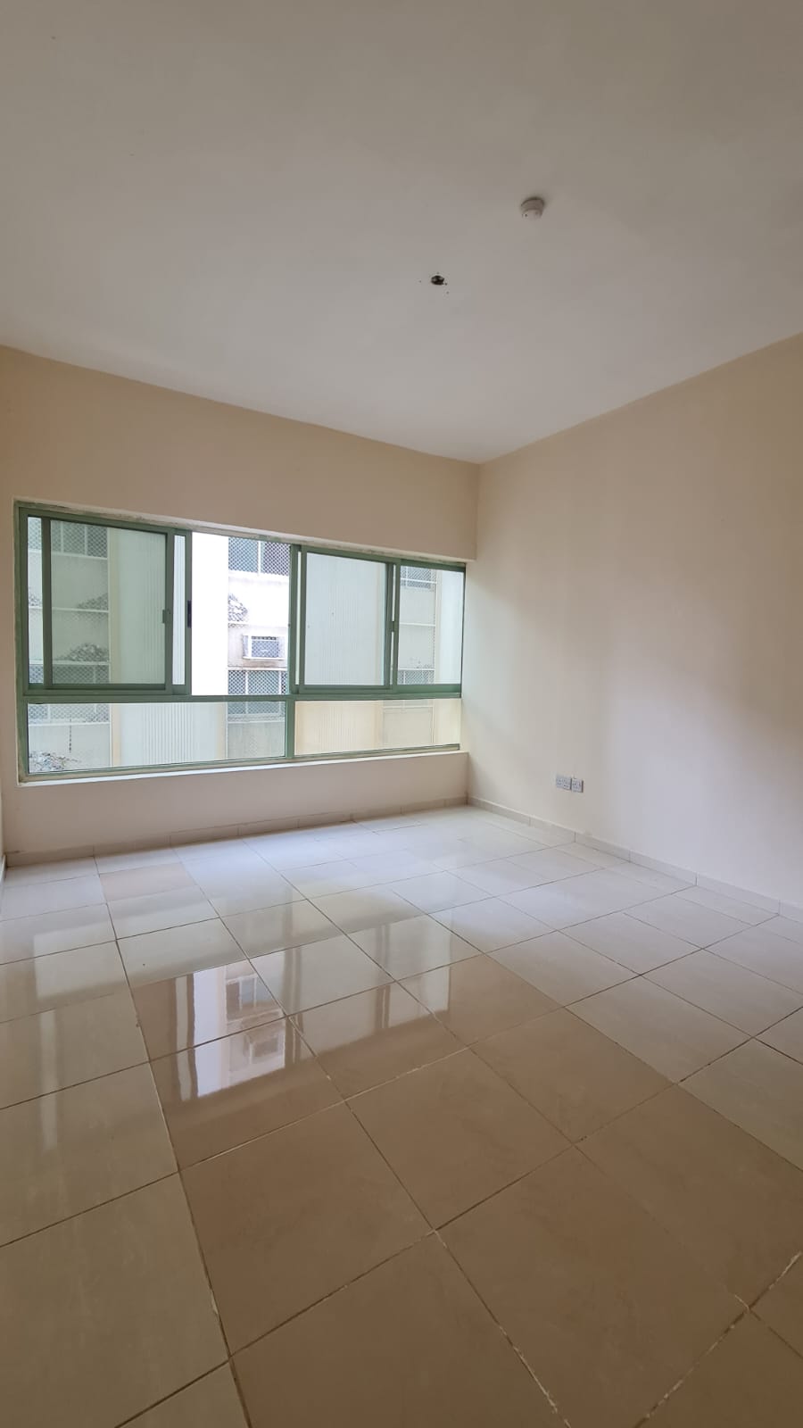 A one-bedroom apartment with a living room is available for rent in Al Shuwaheen