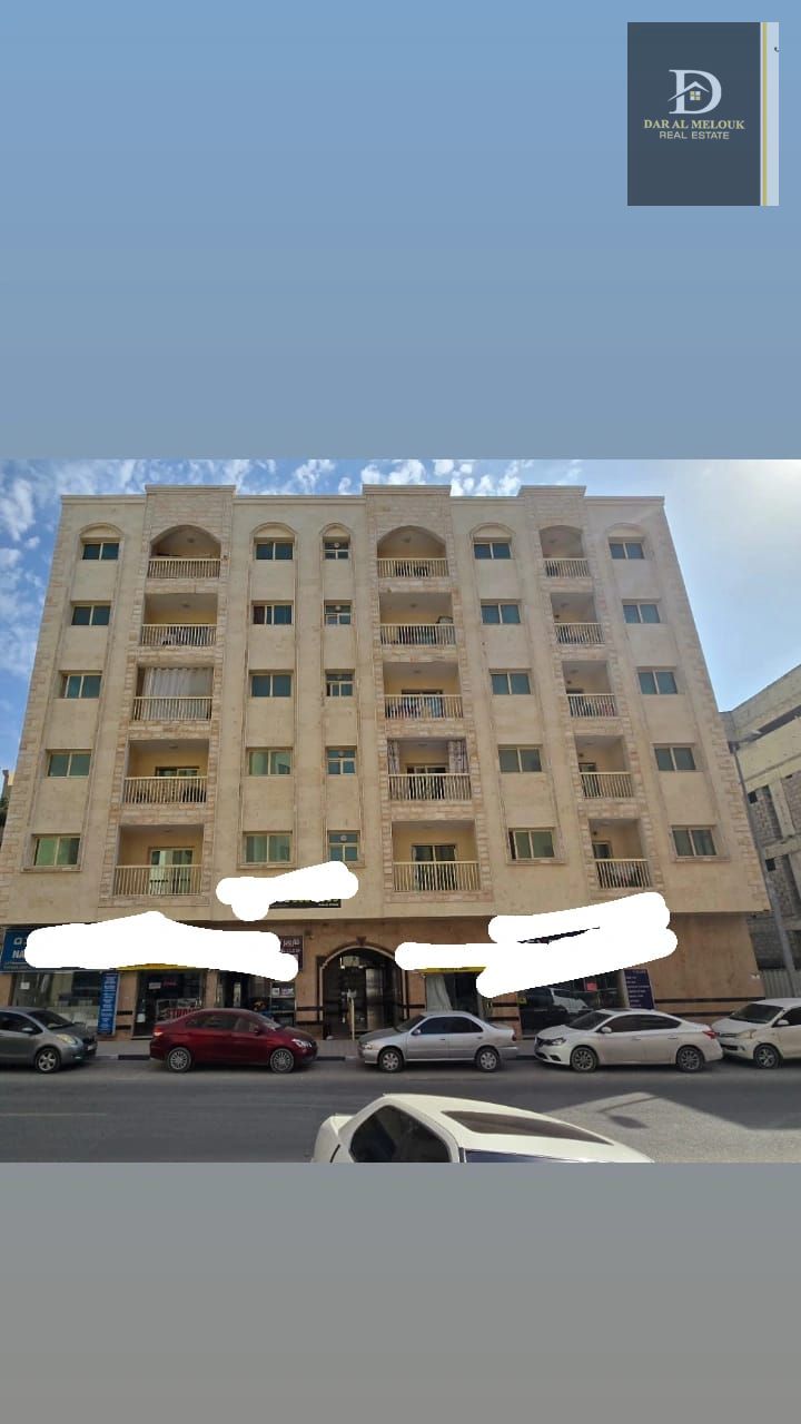 For Sale in Sharjah Building in Al Musalla Area Ground floor + 5 upper floors, on a side street