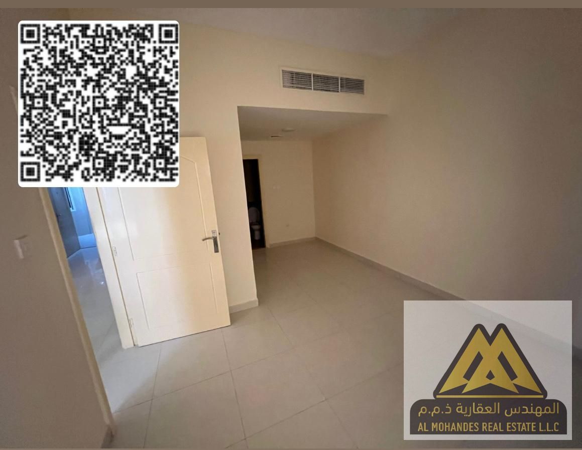 Annual apartment for rent in Ajman, Al Nuaimiya 1 Master bedroom and living room