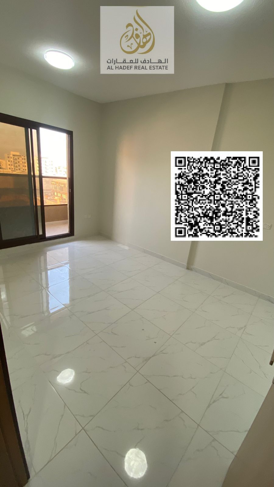 For rent in Ajman, Al Rawda 1, near Al Hamidiya Police Station: a one-bedroom apartment with a living room, two bathrooms, a balcony, a master bedroom