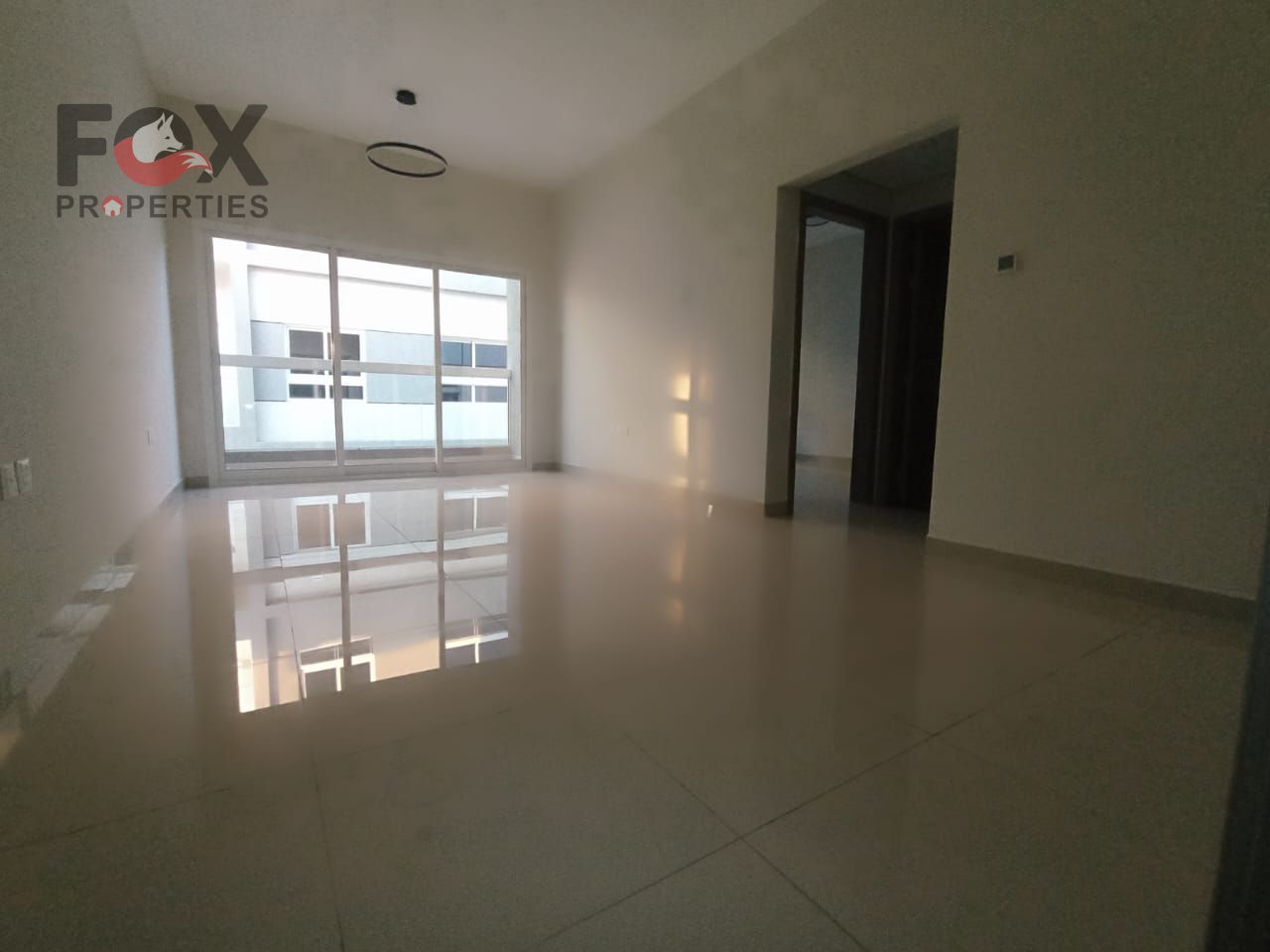 Two-bedroom apartment with a living room for annual rent in Al Jurf 3. Excellent size, first occupancy, prime location near all services.