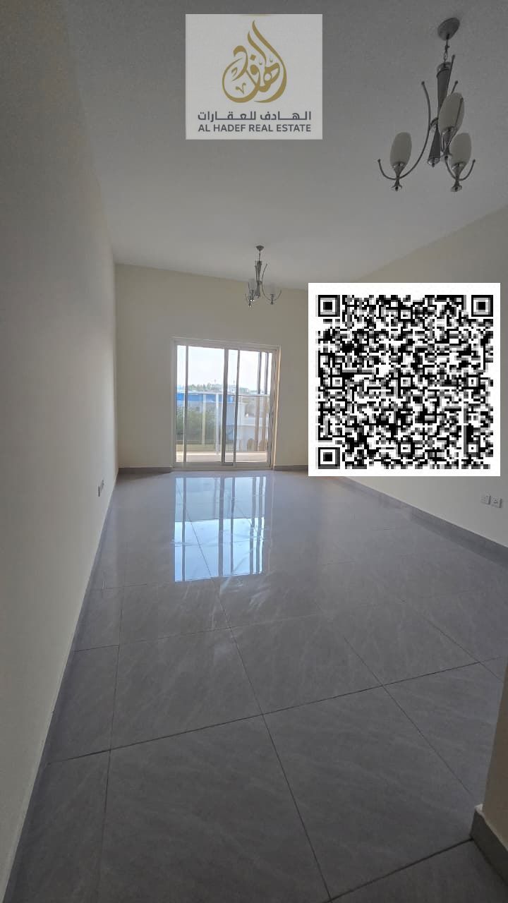 One bedroom and living room for rent in Ajman, Al Rawda 1, 2 bathrooms and balcony, first occupancy building, super deluxe finishing, 4 installments,