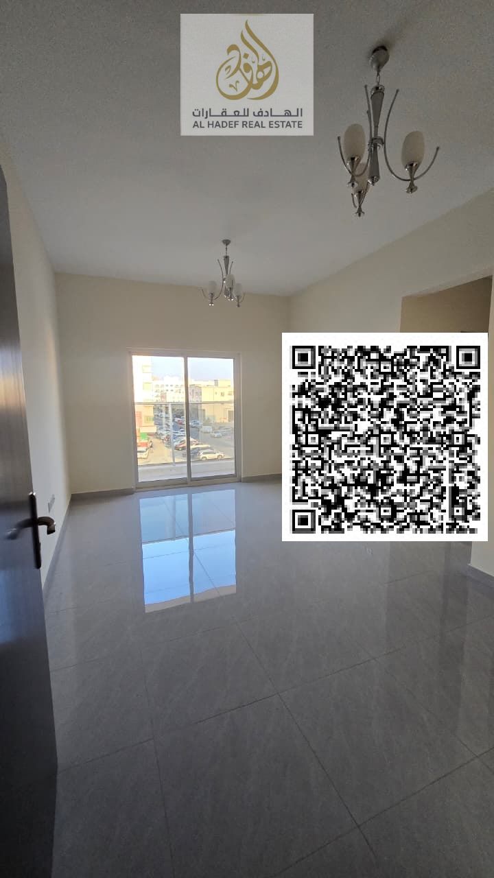 Two bedrooms and a living room for rent in Ajman, Al Rawda 1, with three bathrooms and a balcony. First occupancy building, super deluxe finishing, pa