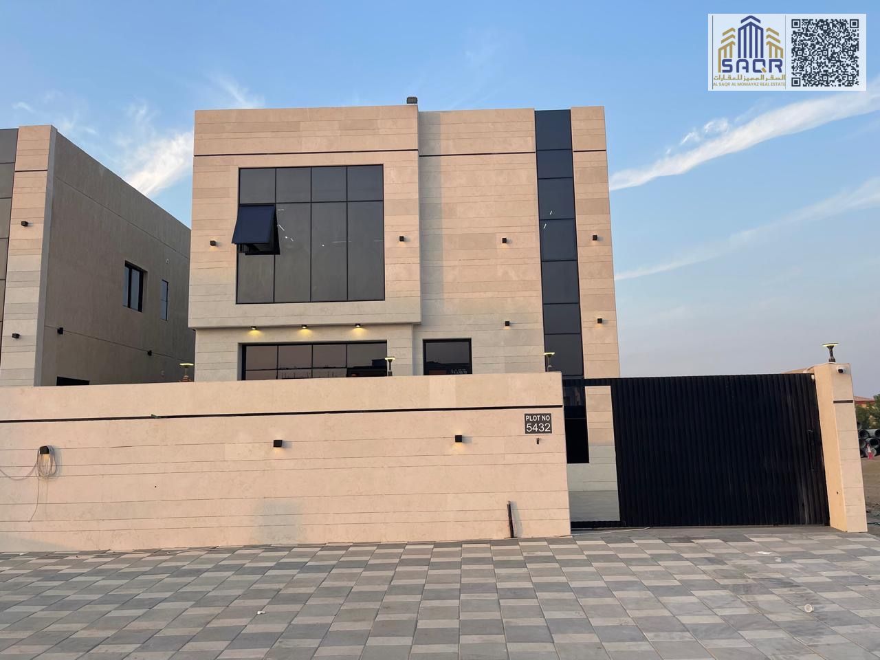 A modern villa for sale in Al Helio 2, designed with contemporary architecture and high-quality finishes. The villa features 4 spacious bedrooms, providing comfort and privacy for the whole family, along with a bright living hall ideal for daily living an