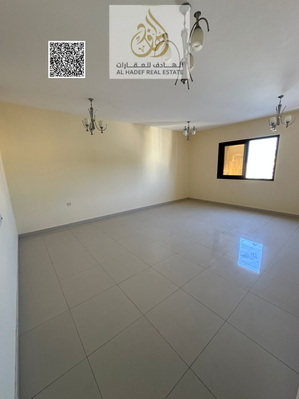 Two rooms and a living room for annual rent with built-in wardrobes and a balcony. Second tenant in Al Nuaimiya area.