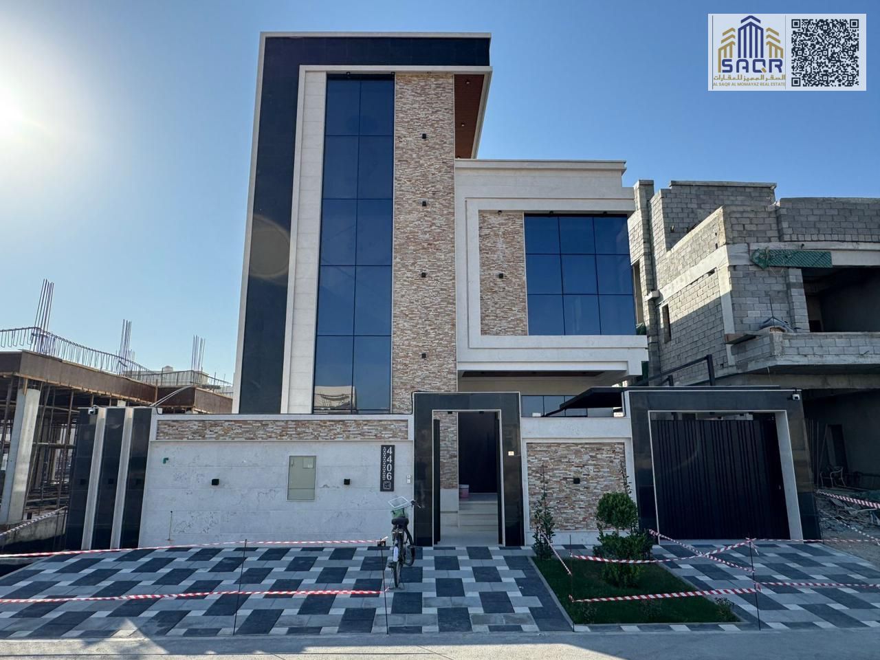 For Sale: Distinctive Modern Villa in Al Yasmeen, Ajman • 3 floors with an elegant stone facade. • 5 master bedrooms with built-in wardrobes. • Majlis with a separate entrance and washroom. • 2 spacious living rooms with sophisticated décor. • Fully equip