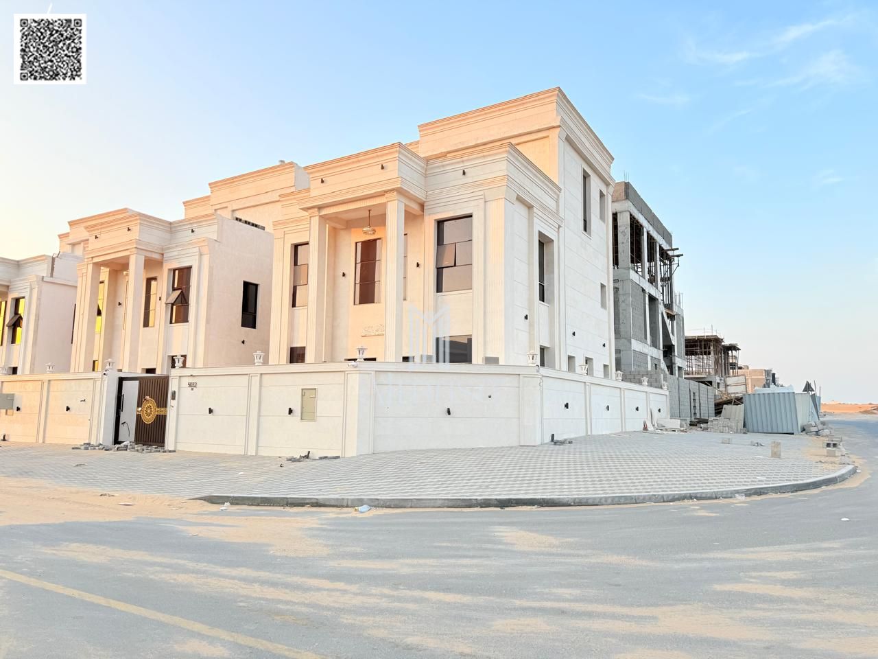 For Sale: Classic Corner Villa | Corner of Two Streets, Al Helio 2 – Ajman | Two Floors + Roof | 6 Master Bedrooms | Freehold for All Nationalities. A