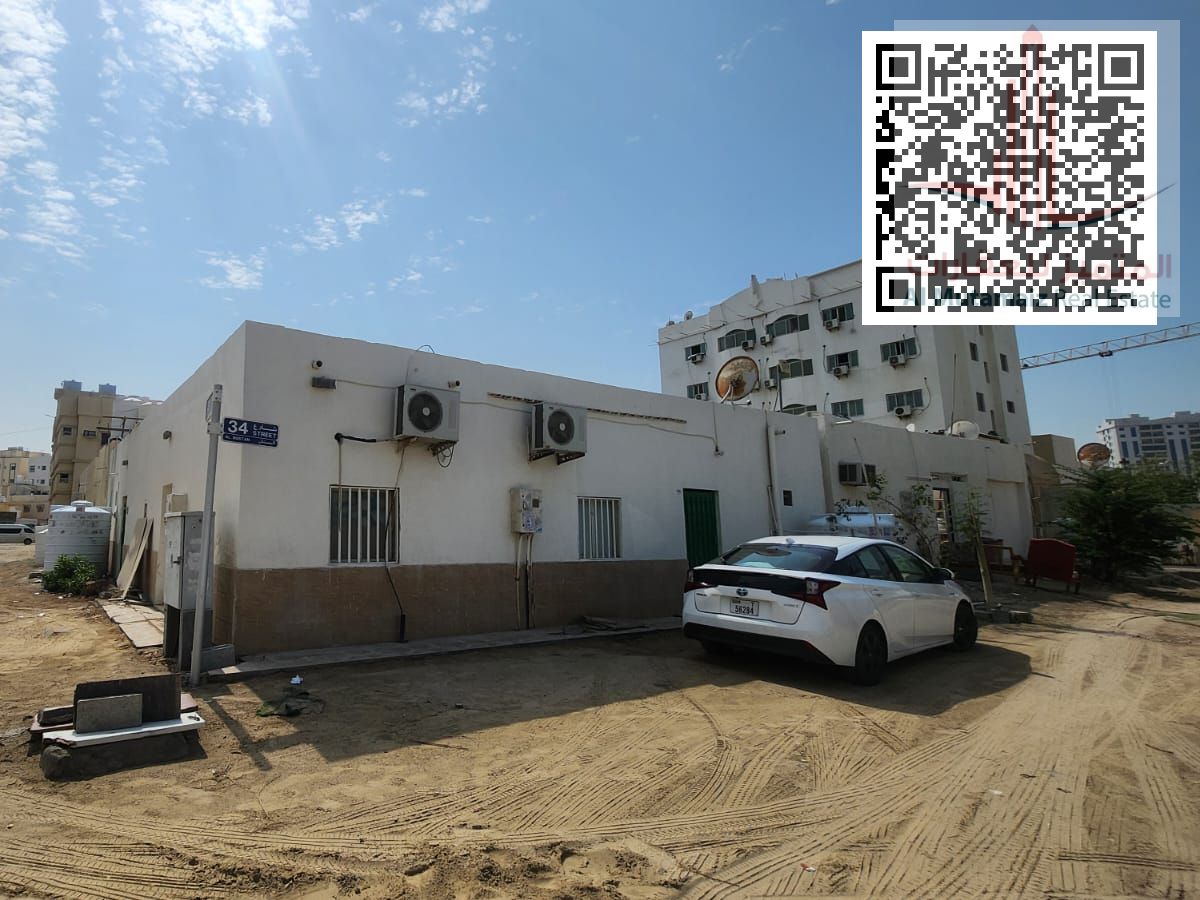 Traditional Arab house for sale at an excellent price in Al Bustan, corner location on two streets, currently rented with excellent income.