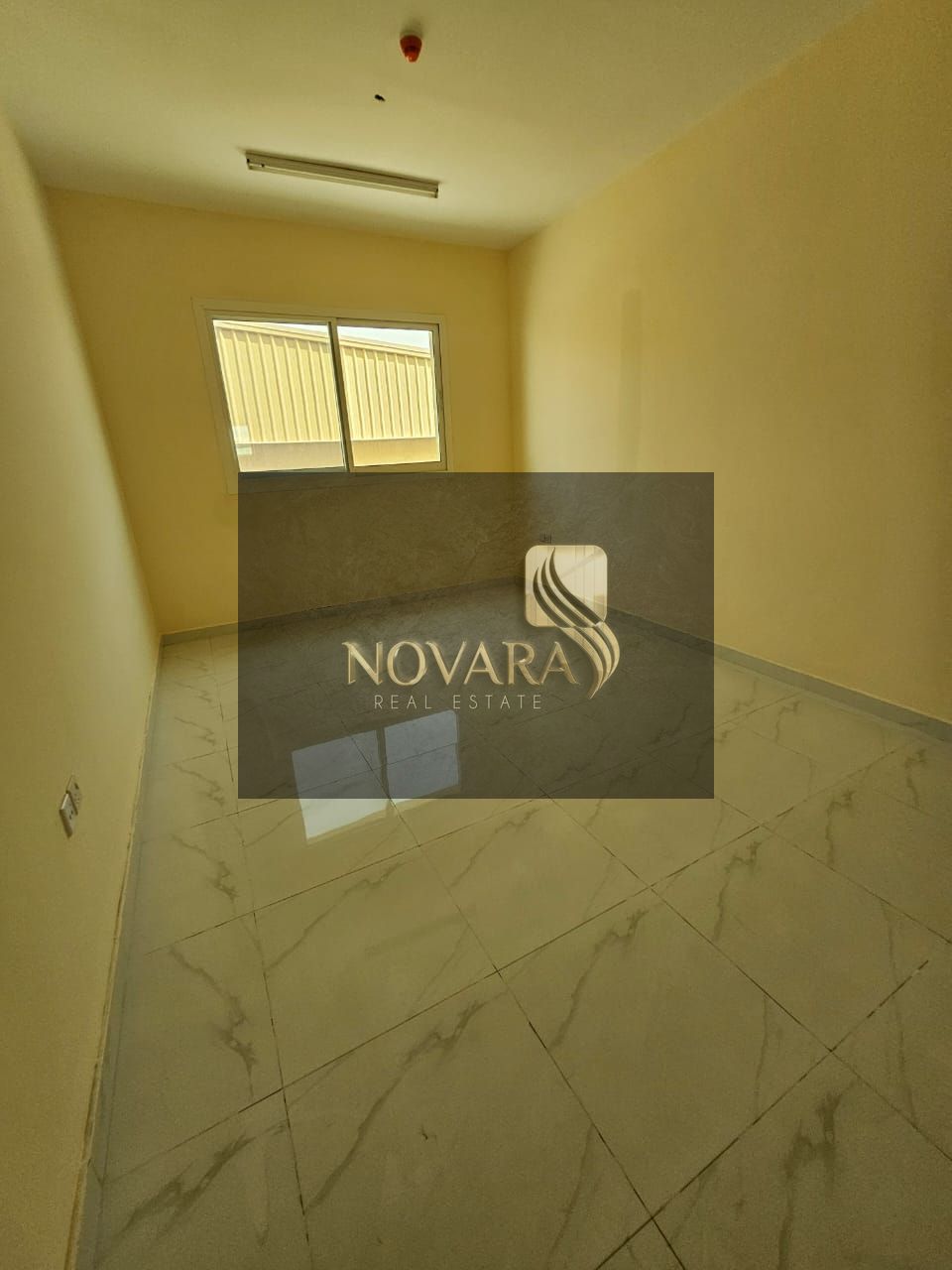 New offices, first occupancy in Al Jurf Industrial Area 3, behind the Chinese market, one room, hall and two bathrooms, a vital location suitable for