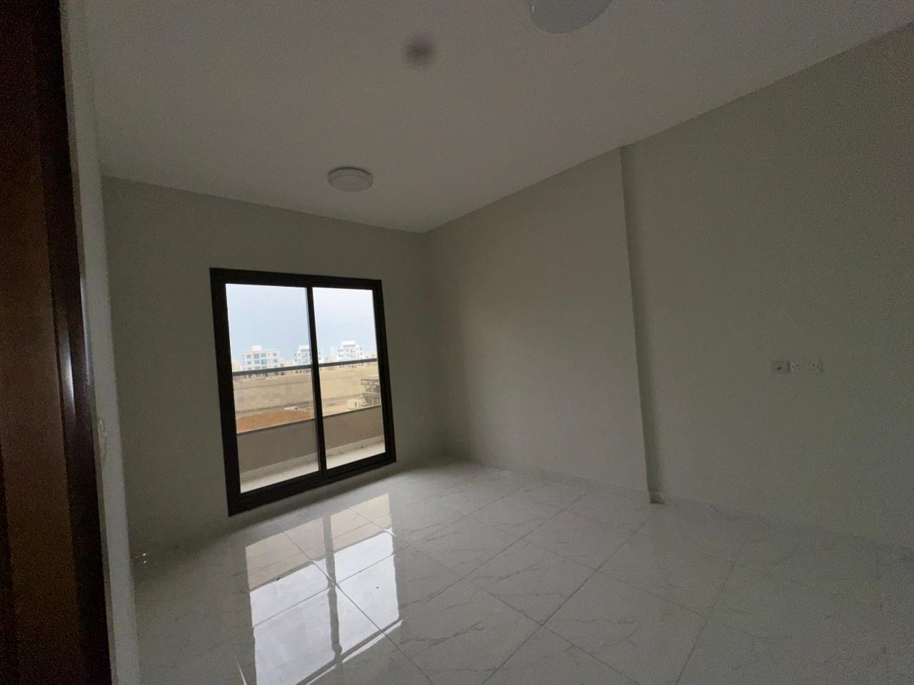 One bedroom, living room, two bathrooms, and a balcony. Second-hand apartment in Rawda 1, behind Al-Hamidiya Police Station.