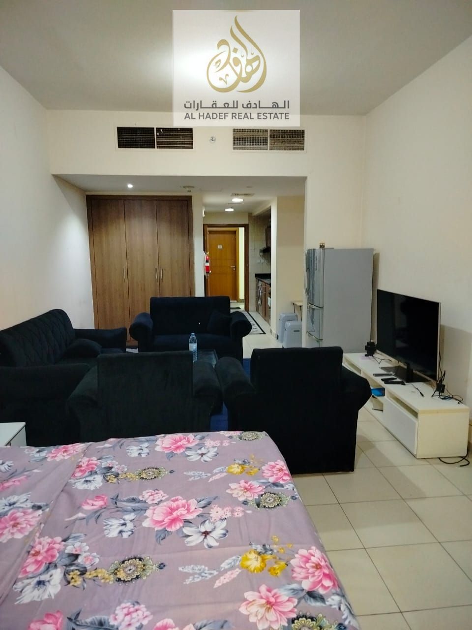 Studio apartment with a semi-detached kitchen, parking, and private garden inside the tower. Excellent space for investment and residence in Ajman at