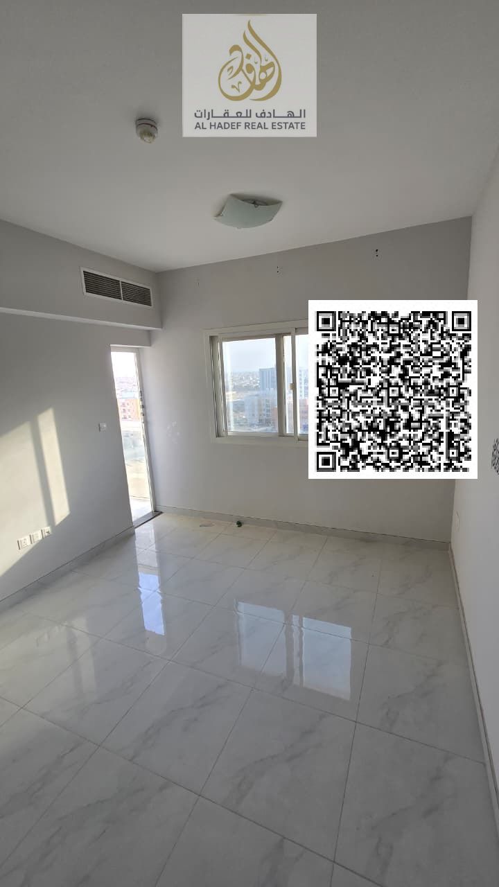 Two-bedroom apartment with a living room, separate unit in Al Jurf 3, two master bedrooms, three bathrooms, balcony, spacious, second occupant, near t