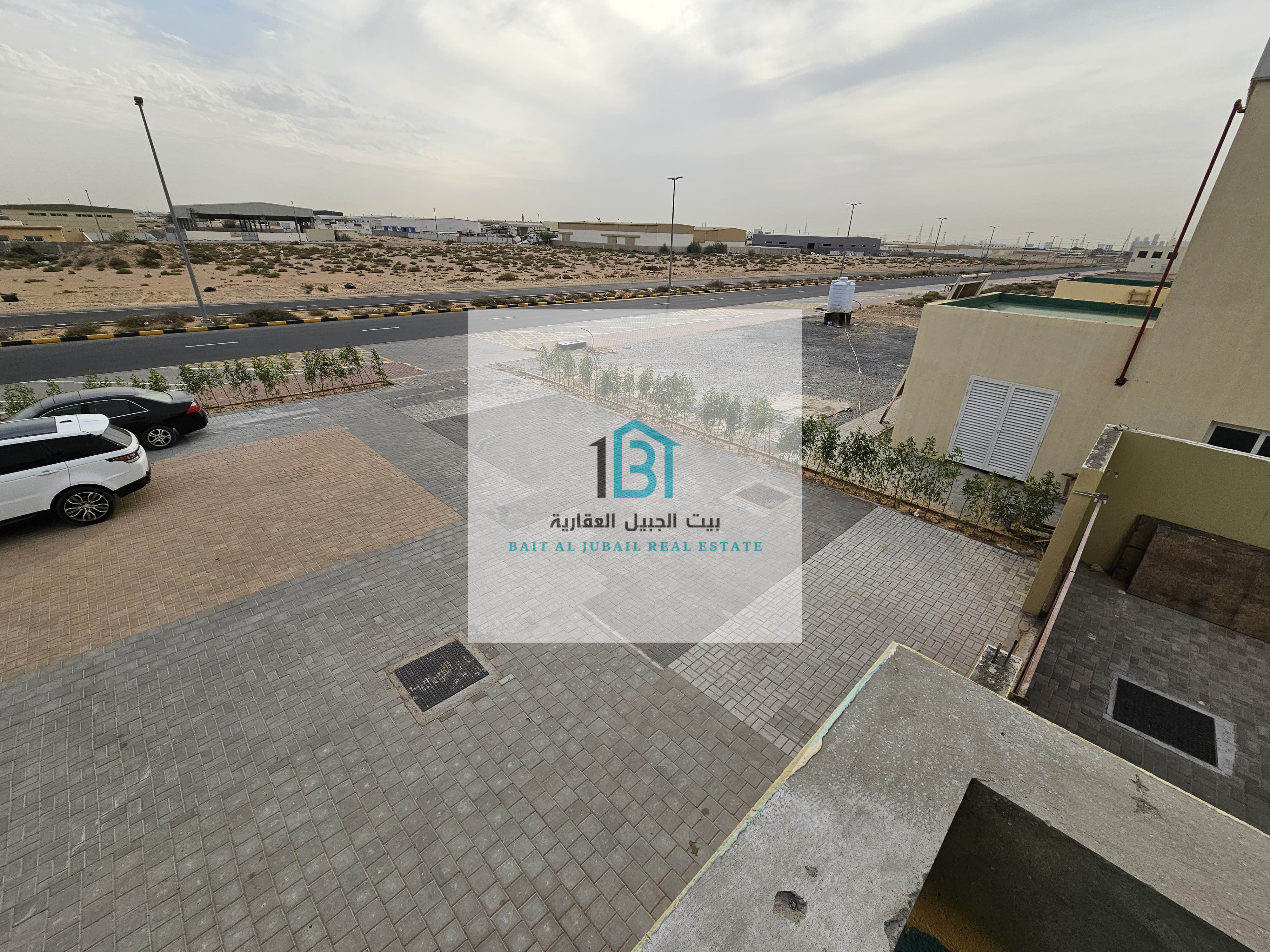 Commercial Land + 2 Industrial Yards in Al Sajaa Industrial Area Prime Location on a Main Road!