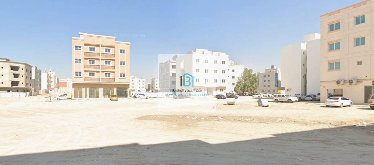 Two Adjacent Mixed-Use Plots in Muwailih - Prime location near schools and essential services