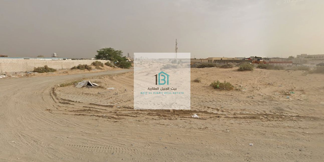Corner Industrial Plot in Al Saja’a Industrial Area – premium industrial plot located on a corner,positioned directly on two main roads (60m & 27m)