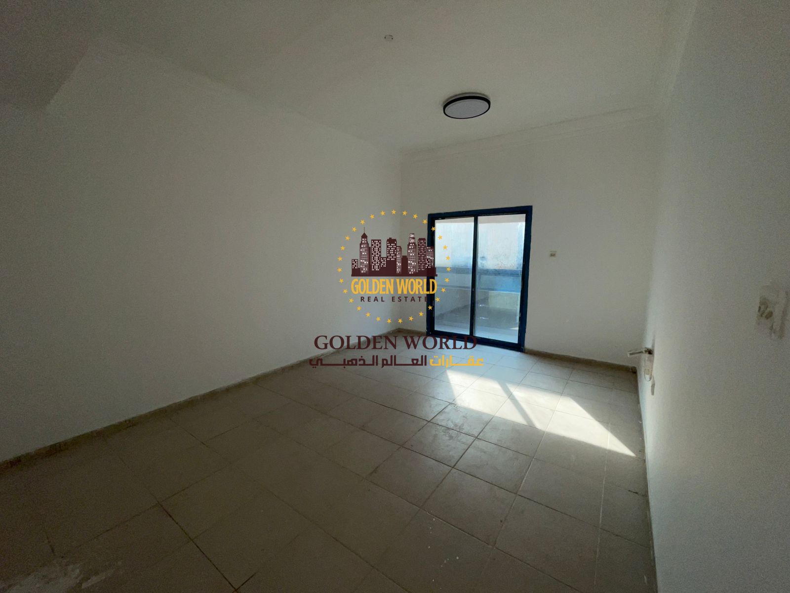 Two-bedroom apartment with balcony for rent in Al Nahda, Sharjah. 2 bathrooms, family-friendly, maintenance & 24/7 security included.