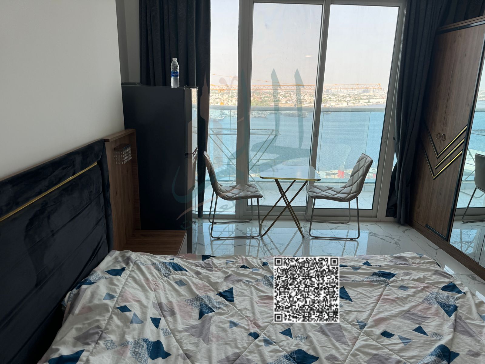 Studio for sale with balcony overlooking creek. unrented. 330,000 including parking. Ready for occupancy or investment.