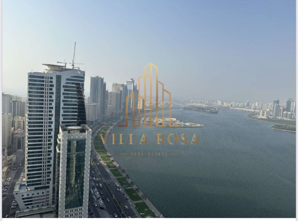 For Sale: Luxury 2-Bedroom Apartment with Living Room and Waterfront View – Amir Bukhamsin Tower | Al Majaz 3 – Sharjah
