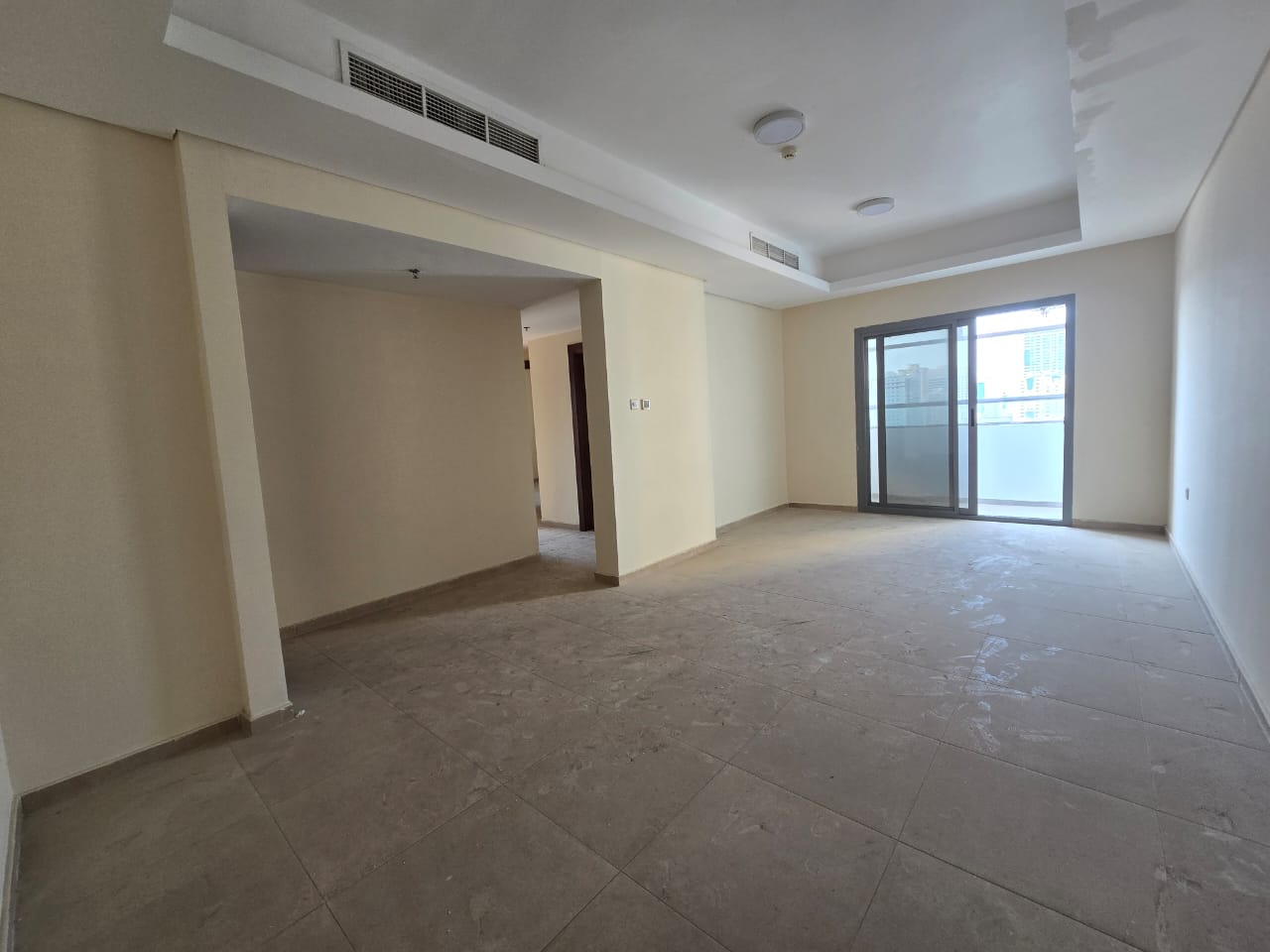 Two-bedroom apartment with balcony and parking in Al Qasimia next to Mega Mall. Open view. Rent AED 45,000.
