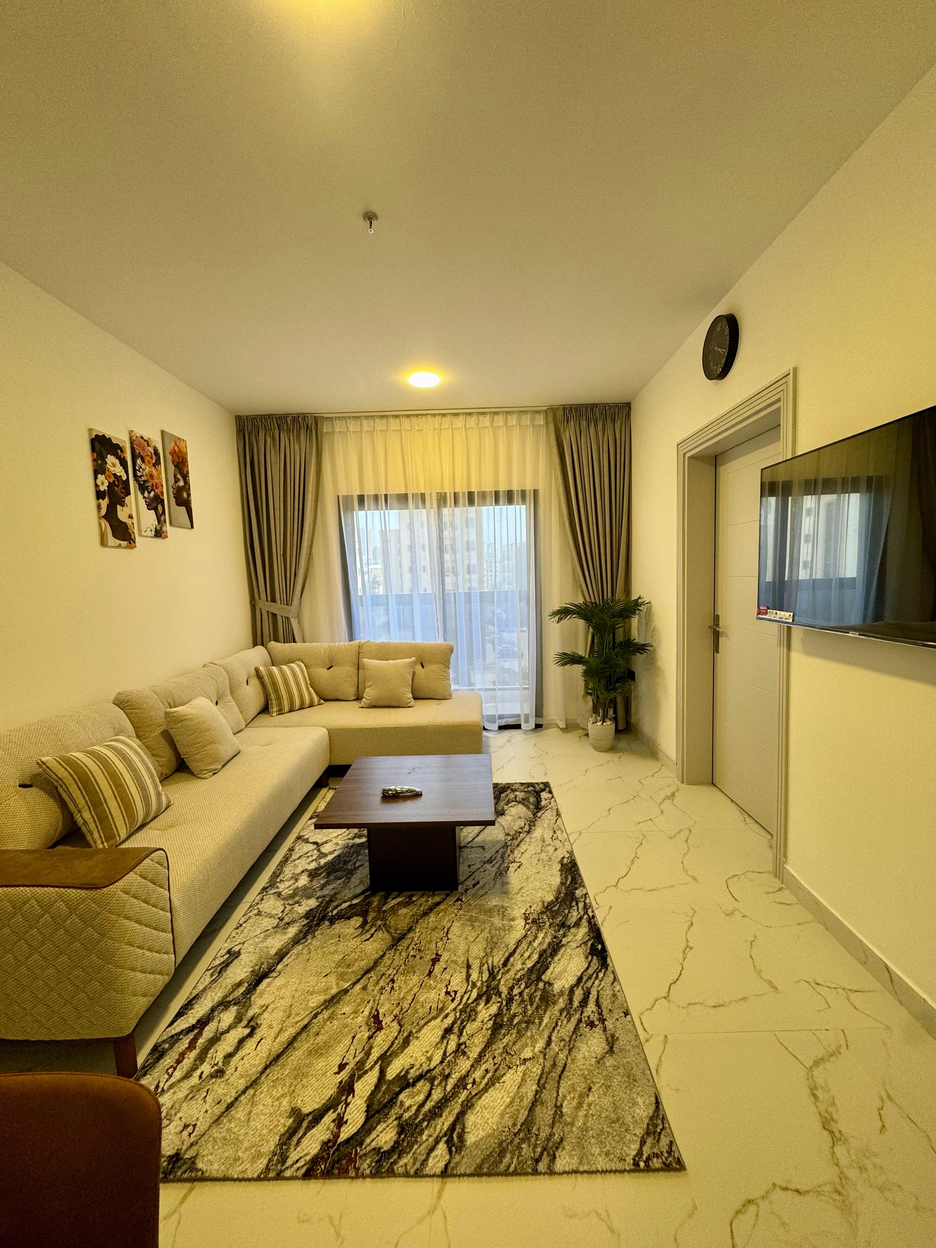 Furnished 1-bedroom apartment for monthly rent on Ajman Corniche, Al Nakhil 2, sea view balcony, spacious layout, all bills and internet included.