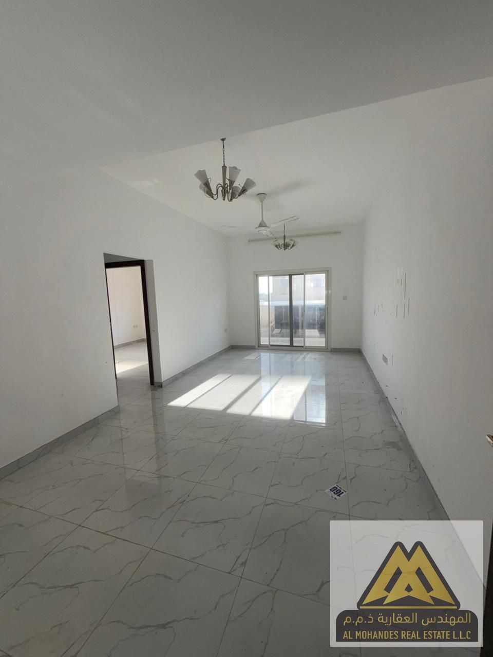 2-Bedroom apartment for rent in Al Muweihat – 2 bathrooms, balcony, central AC, spacious, near schools and Mohammed Bin Zayed Street, AED 42,000/year.