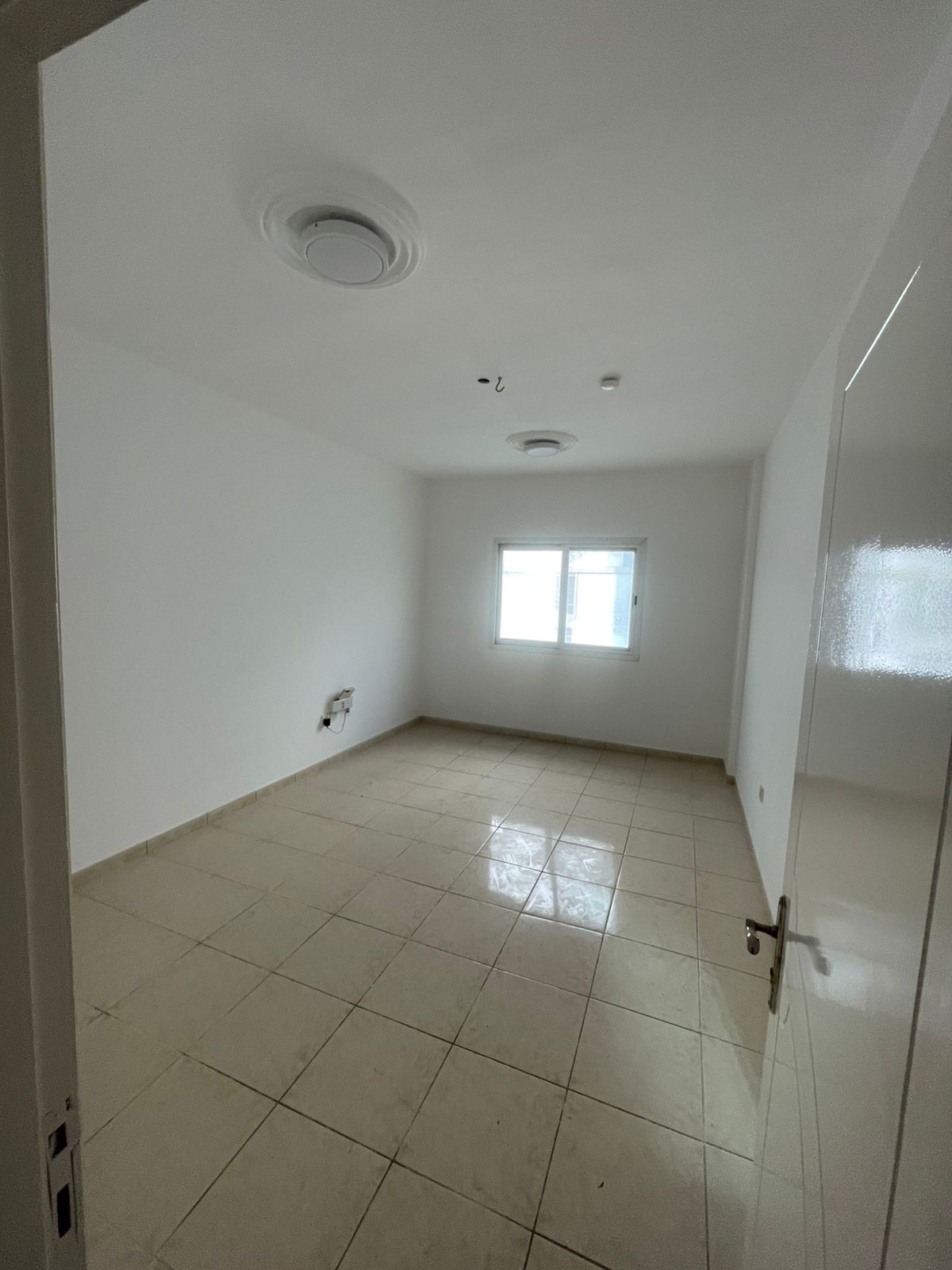 For rent in Al Qasimia / Al Mahatta, an elegant 1-bedroom apartment with hall in a very high-end building, featuring a balcony, bathroom, and a prime
