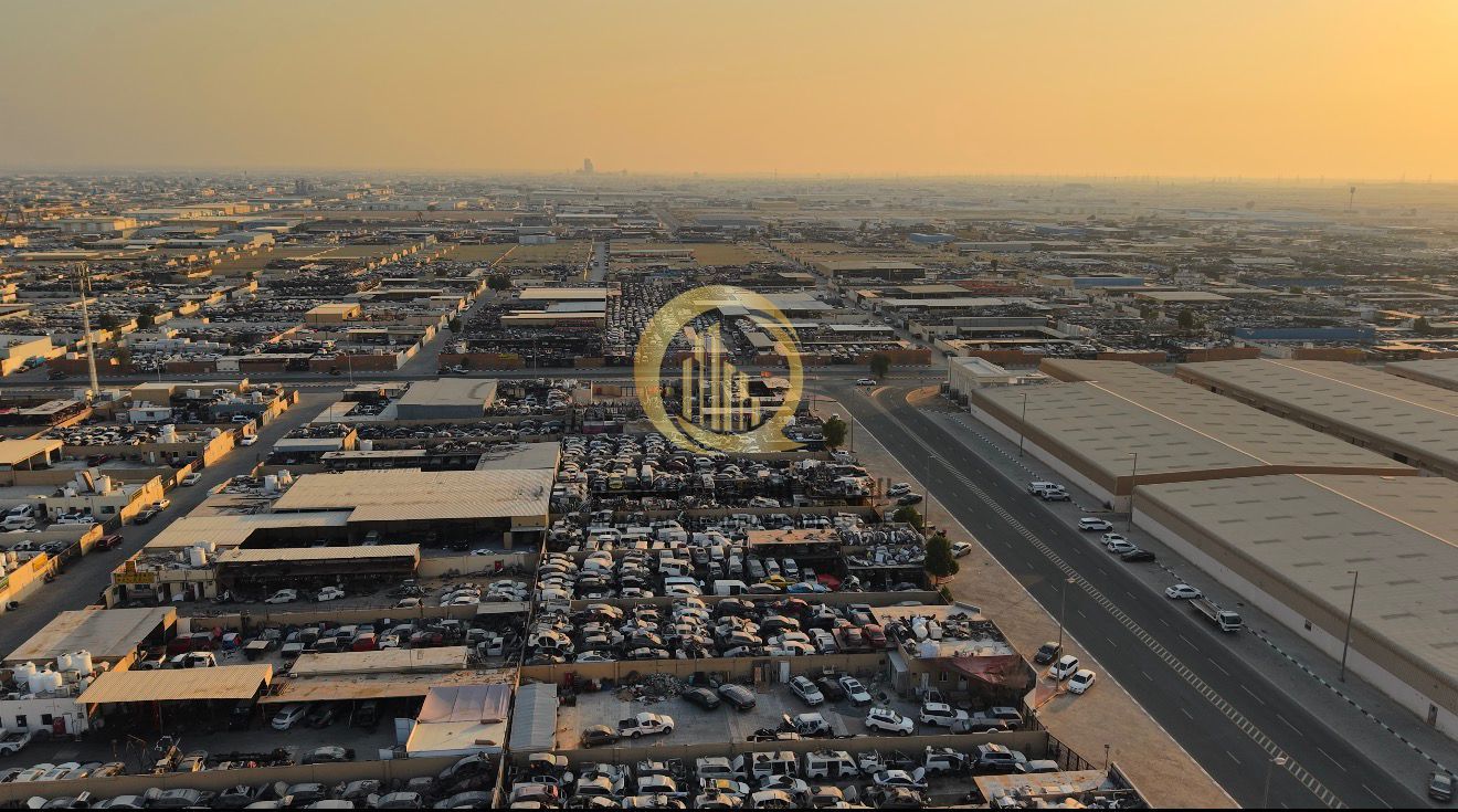 For sale: a plot of land in the Emirates Industrial City, Al-Sajaa Industrial Area. Excellent location right in the heart of the scrapyard. Area: 17