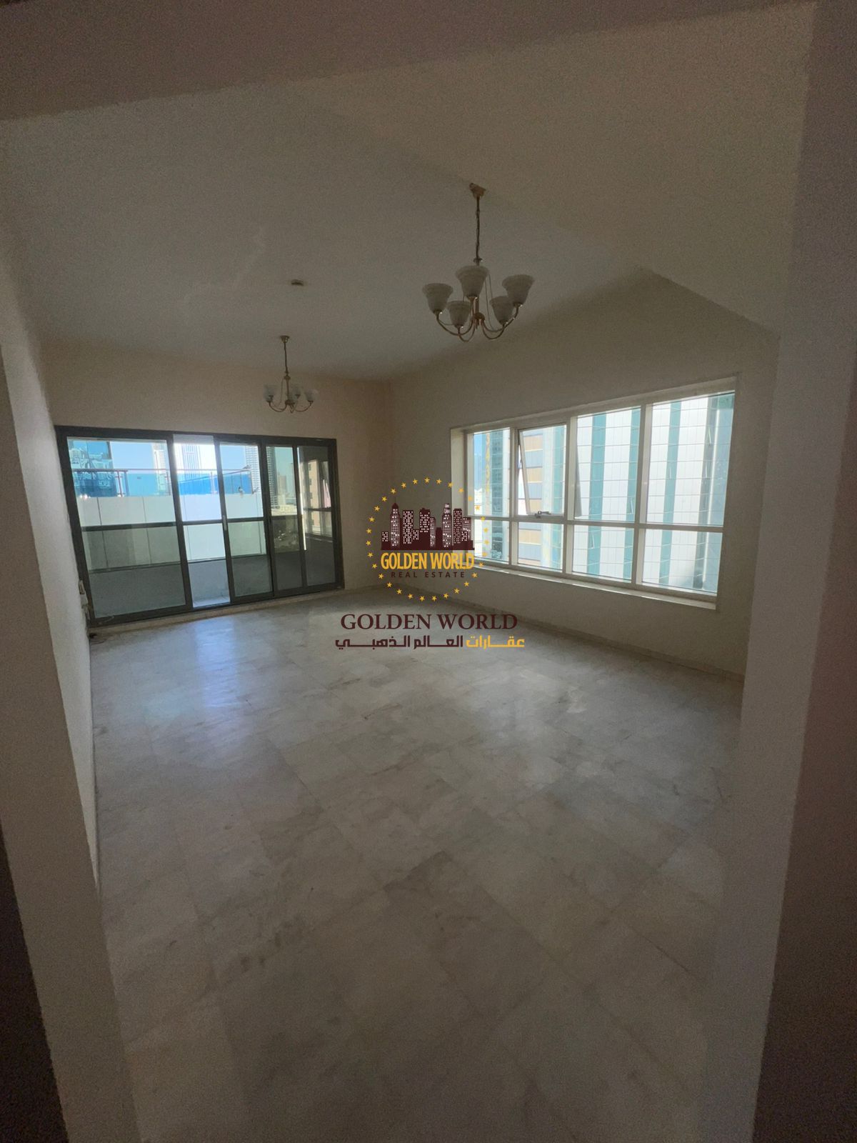A distinctive apartment in Al Taawun featuring two bedrooms and a living room with a balcony and an open view. It includes a master bedroom, two bathr