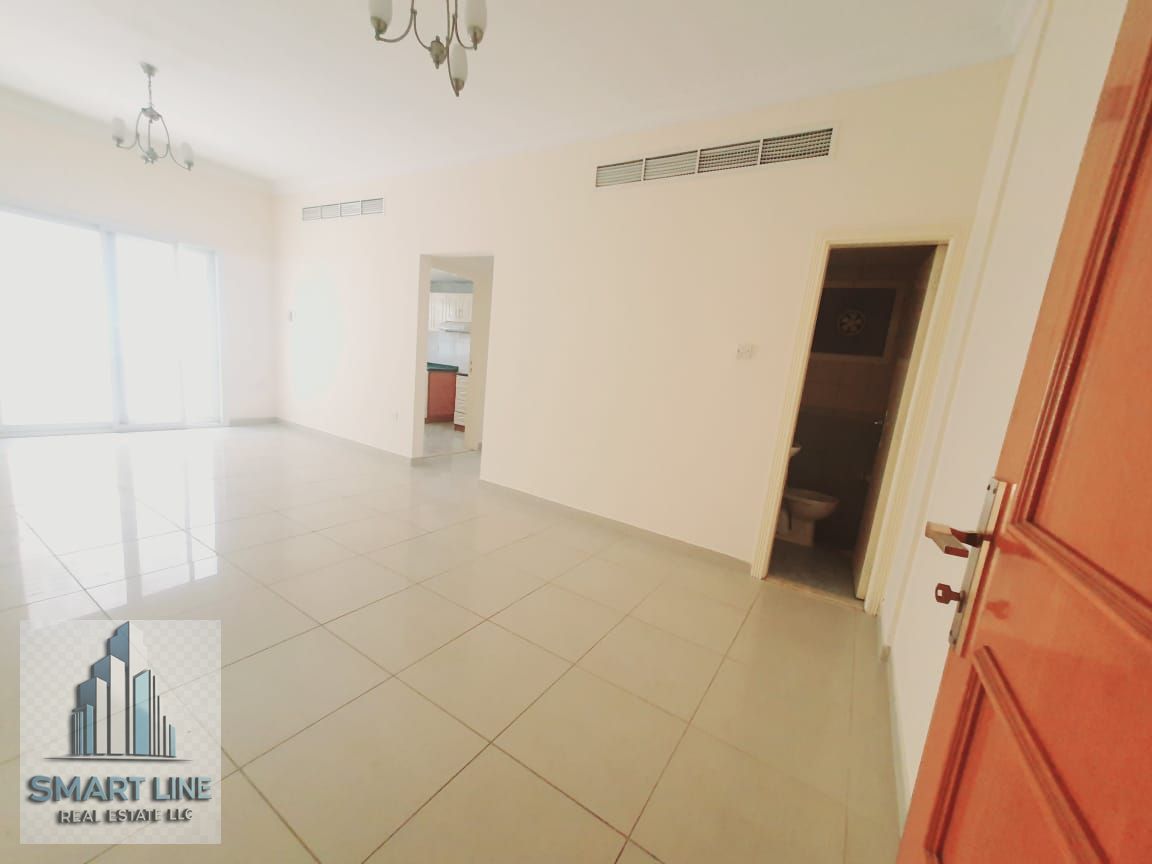 CENTRAL AC NICE 2 BHK WITH BALCONY AND WARDROBE AVAILABLE IN AL QASIMIA