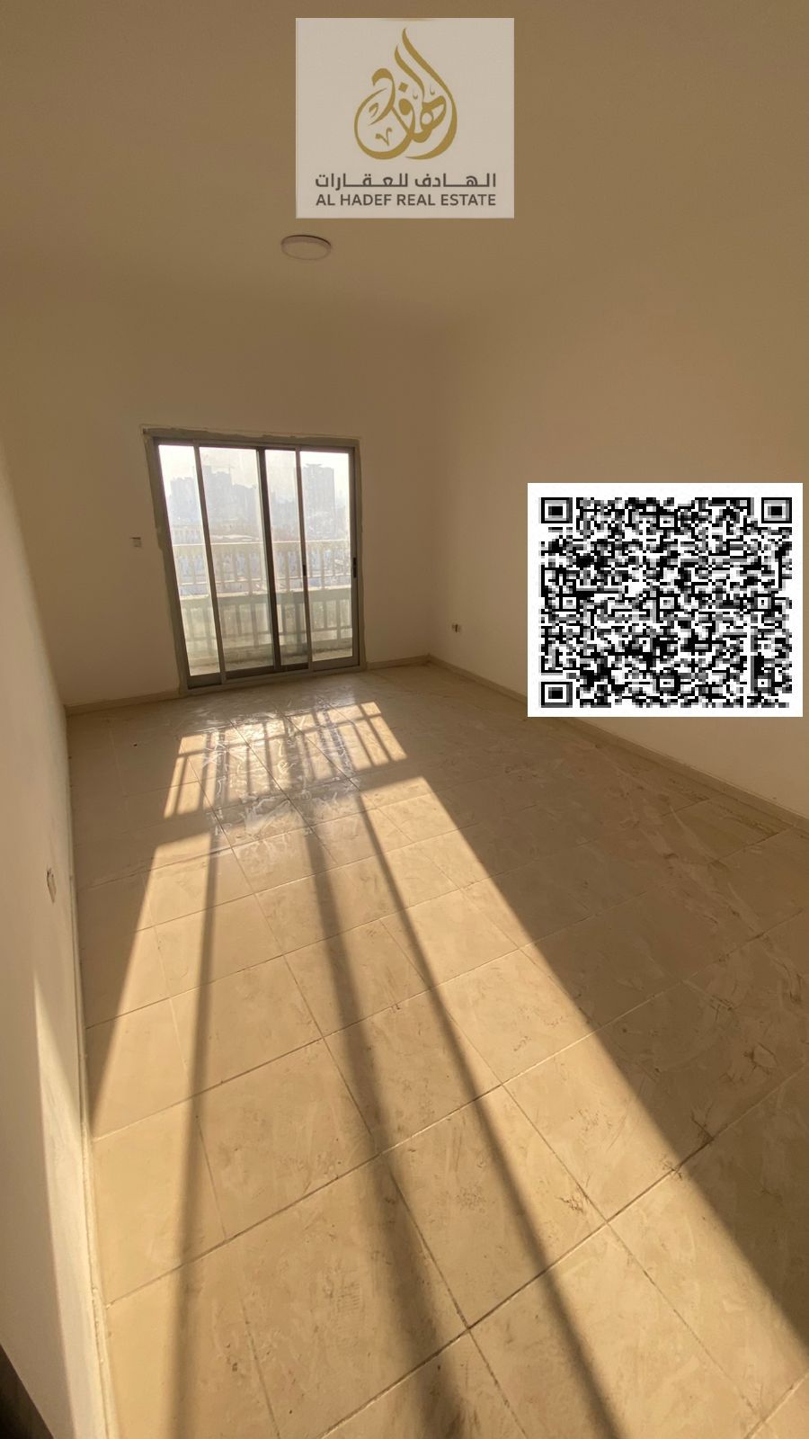 Two bedrooms and a separate living room in Al Nuaimiya, Al Ittihad Street, with two bathrooms and a balcony, close to Emirates Markets. Rent is 36,000