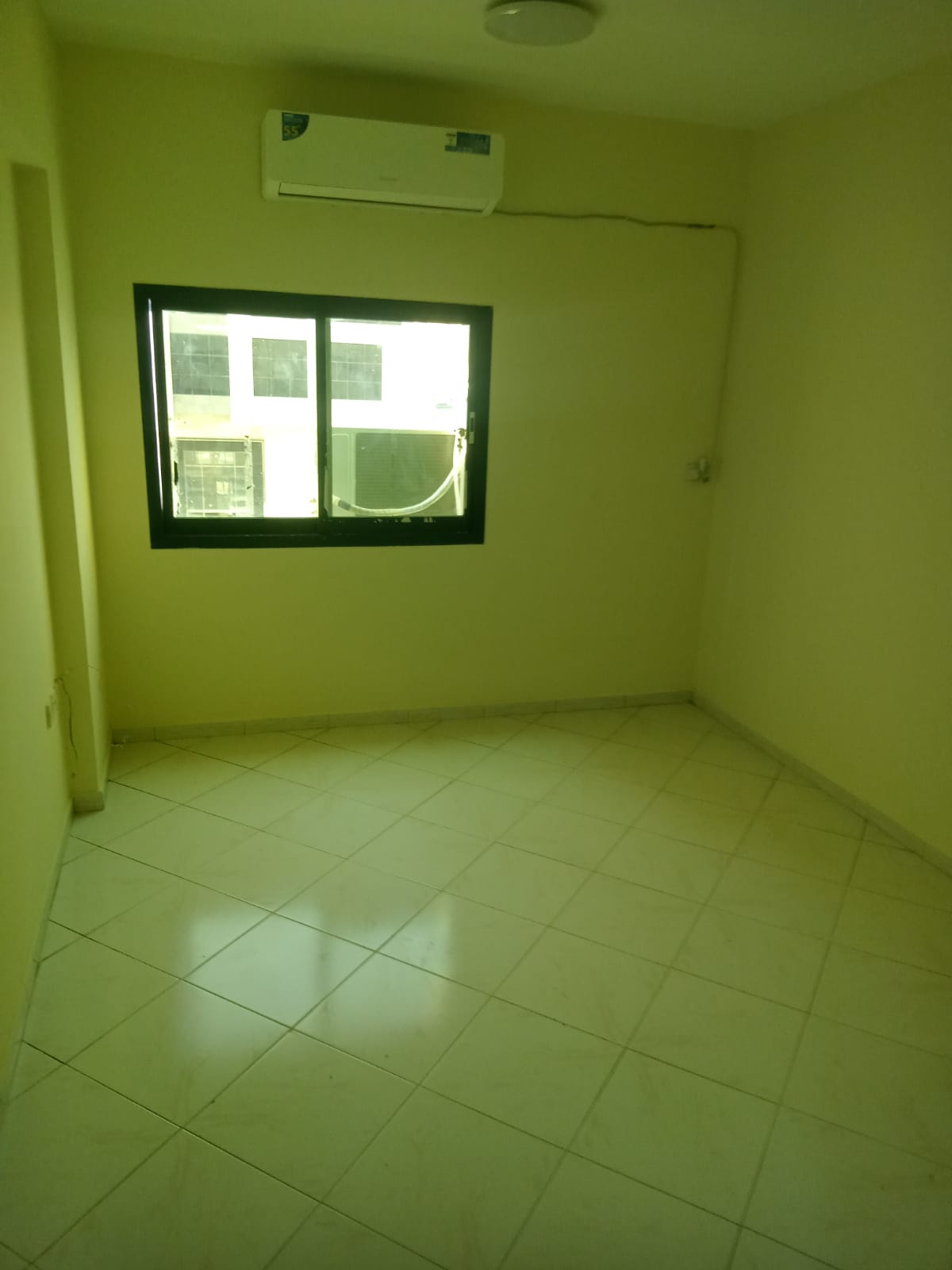 For rent in Industrial Area 2 – Ajman, behind Nesto and opposite Thumbay Hospital. Spacious 2-bedroom apartment with hall, distributor area, balcony,