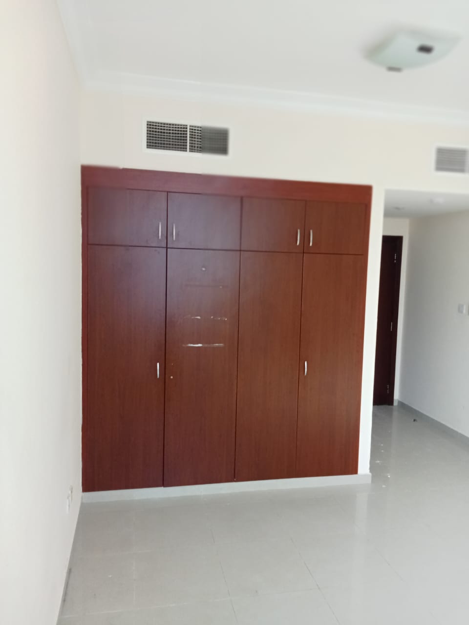 For annual rent in Sharjah, specifically in Al Nahda area: 3 bedrooms, a living room, central air conditioning, excellent size.