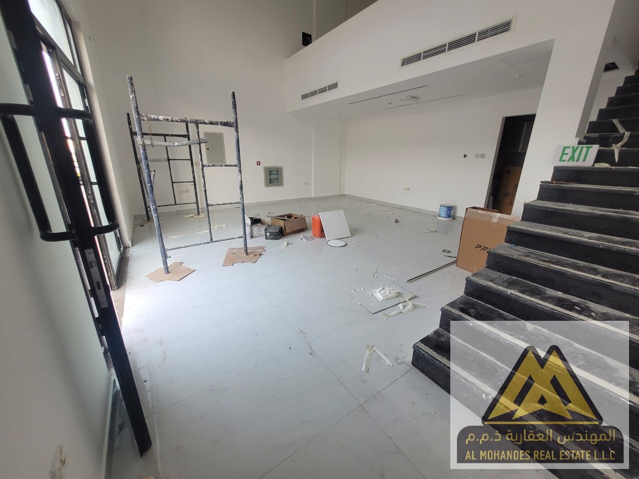 Commercial Shop for Rent in Al Nuaimiya 3 – 900 Sq. Ft. with Mezzanine, Prime Location near Grand Mall, AED 100,000/year.