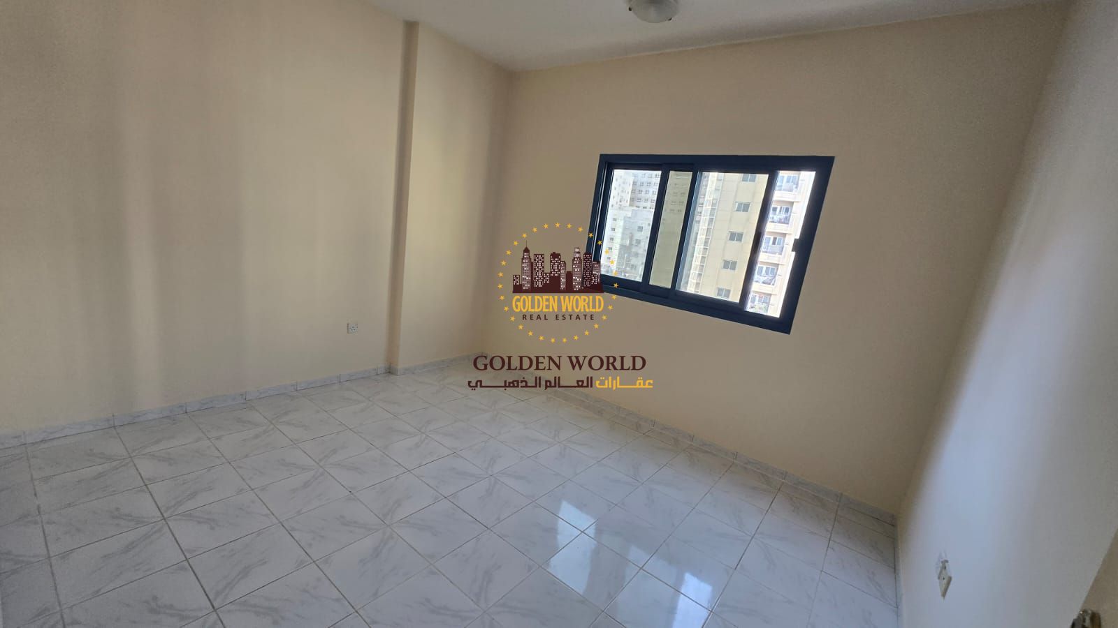 Two-bedroom apartment with living room in Al Qasimia Al Mahatta, next to the park. Open view, two bathrooms, practical layout, close to services. Annu