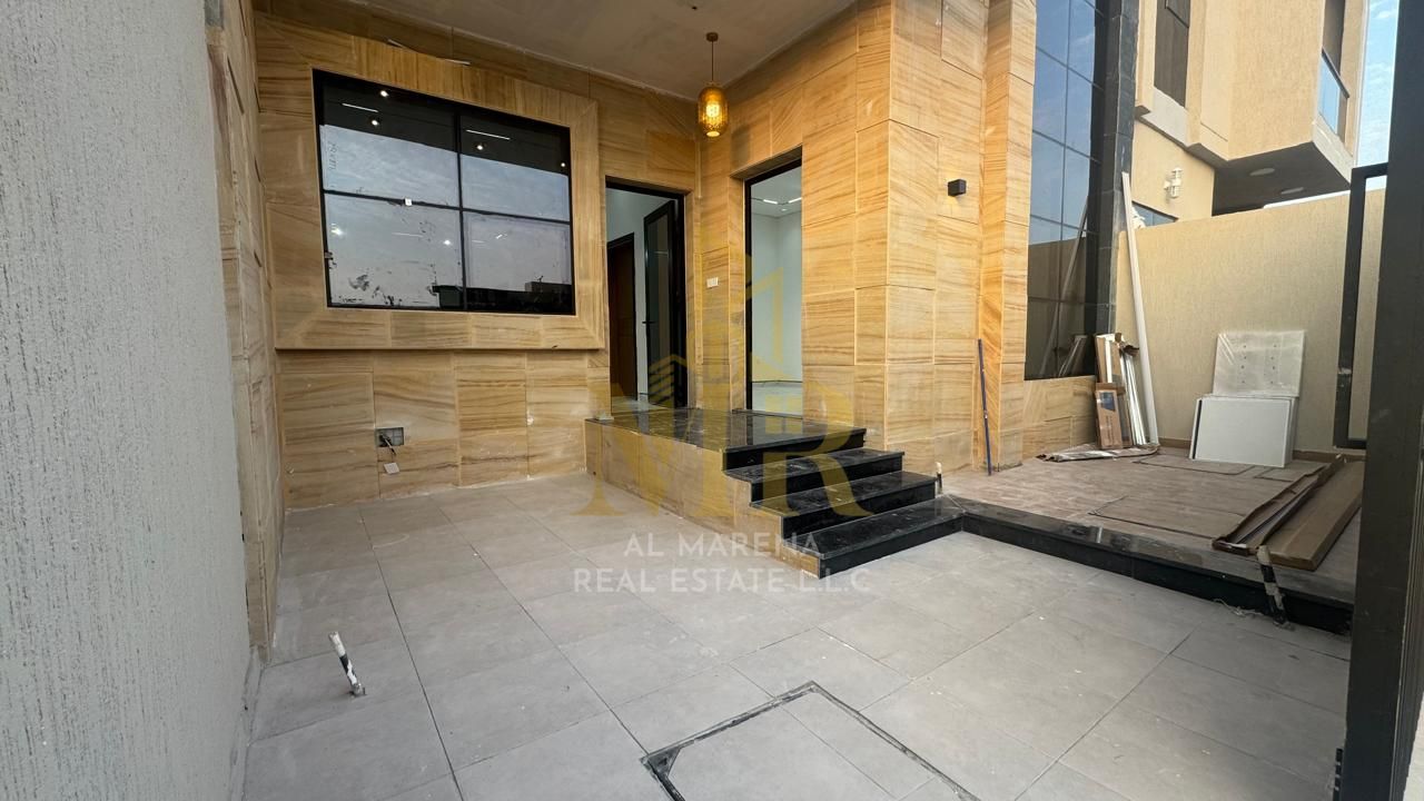 Luxury villa for sale in Al Helio 2, Ajman, including registration and ownership fees. Modern design, prime location, freehold ownership for all natio