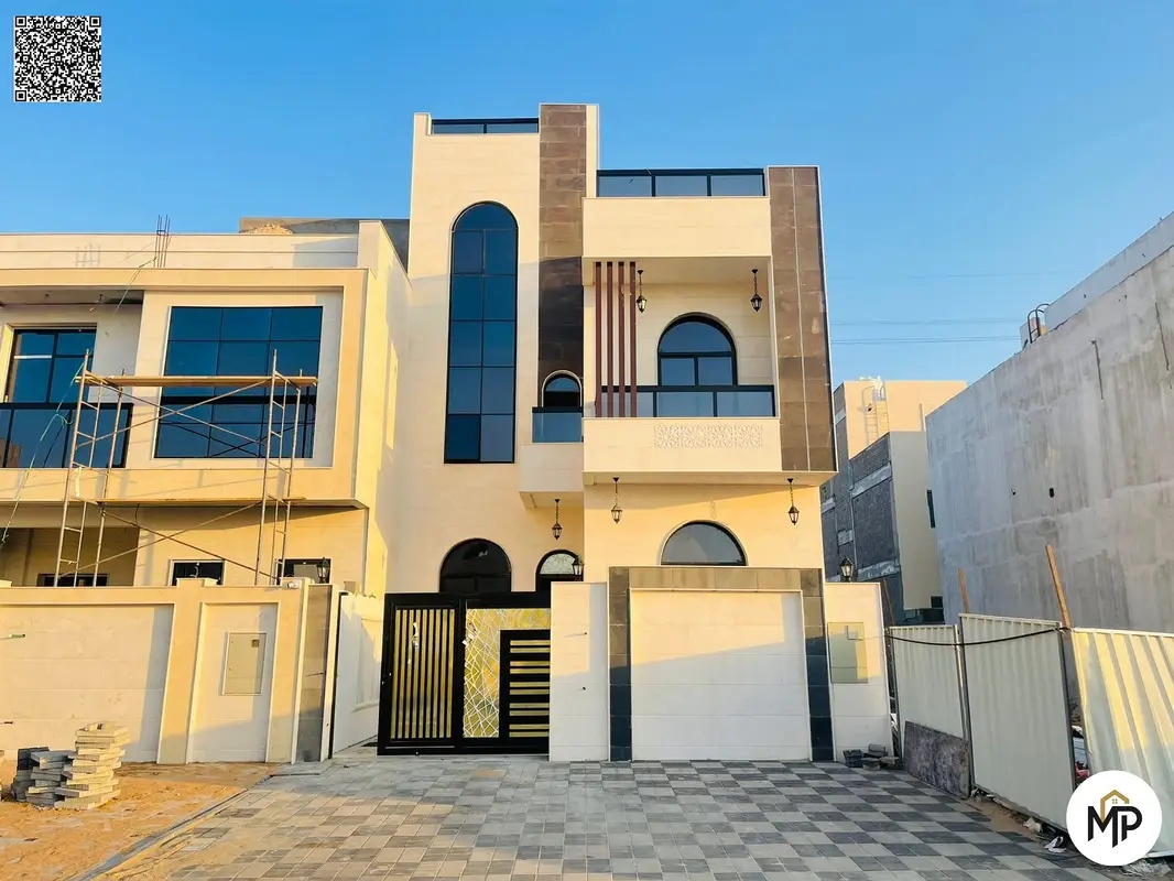 Luxury villa for sale in Al Helio 2, Ajman, including registration and ownership fees. Modern design and prime location. Freehold ownership for all na