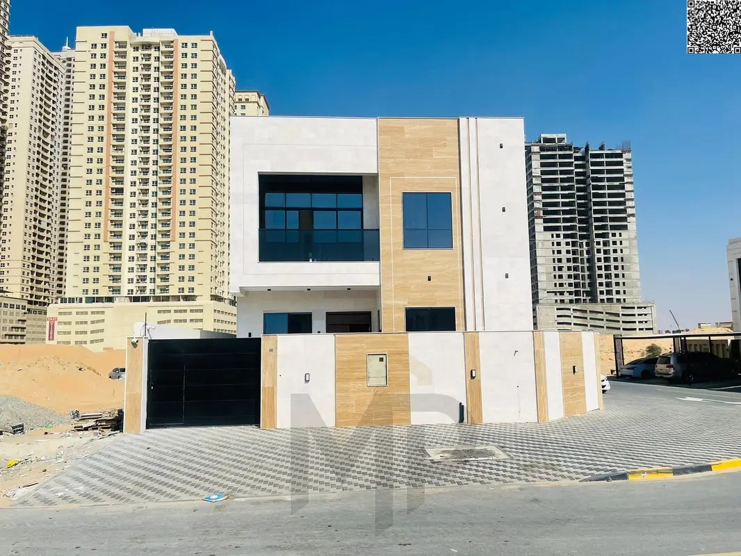 Luxury villa in Al Amrah, Ajman, ready for immediate occupancy with high-end finishes and spacious living areas. Freehold ownership for all nationalit