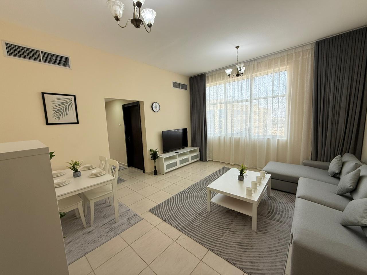 Furnished one-bedroom apartment for monthly rent in the most prestigious complex in Ajman, with easy access to Sharjah and Dubai.