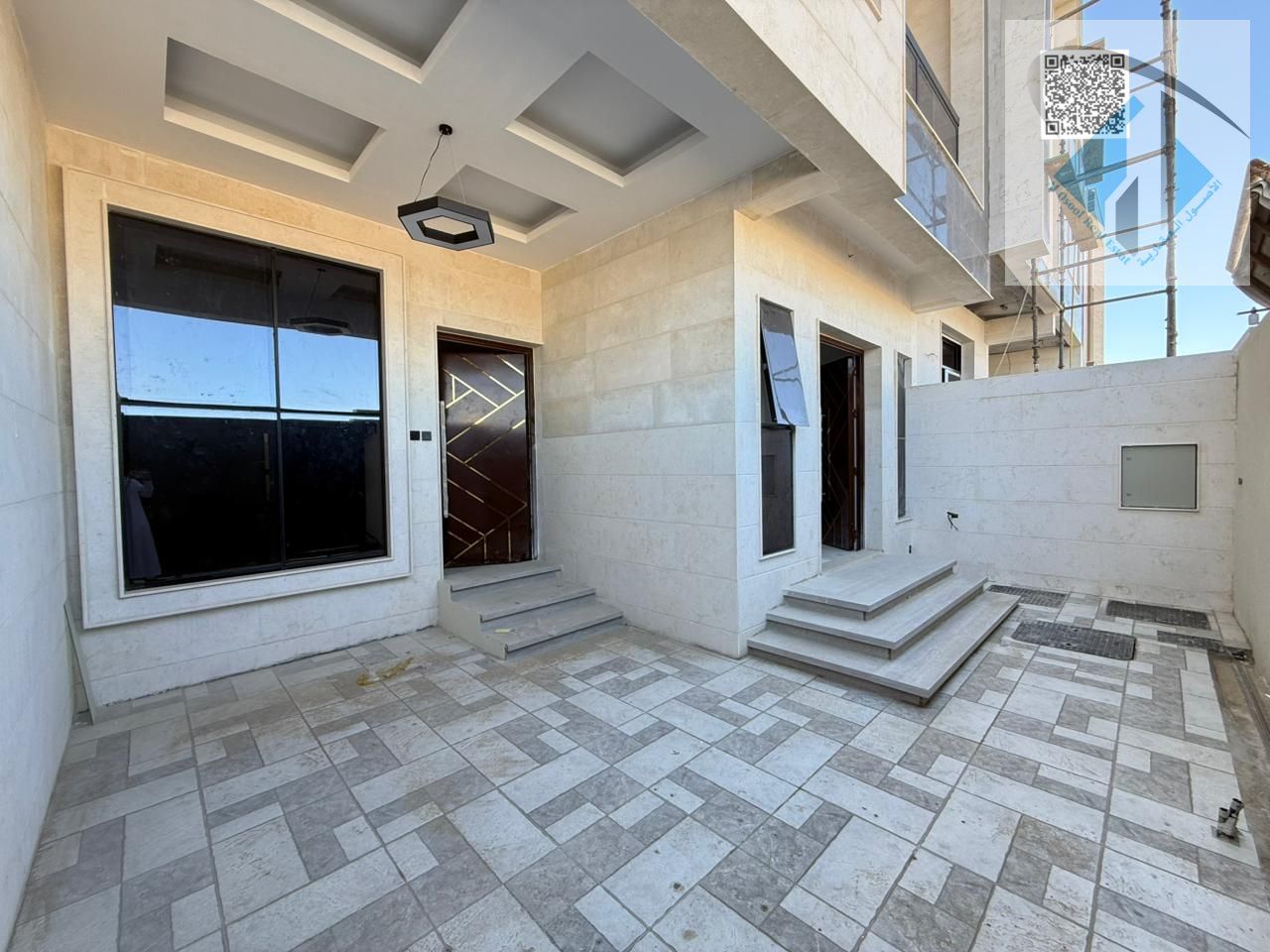 Villa for sale, including registration fees, with monthly installments starting from 5000 dirhams per month.