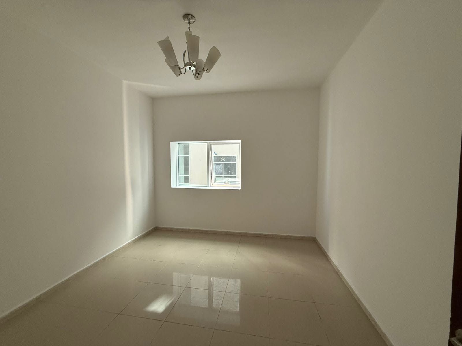 For rent: spacious 1-bedroom family apartment with balcony, prime location near all amenities and easy access to Dubai