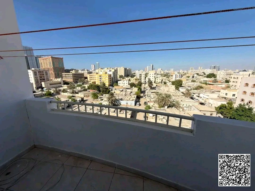 One-bedroom apartment with a living room in Al Rashidiya 3