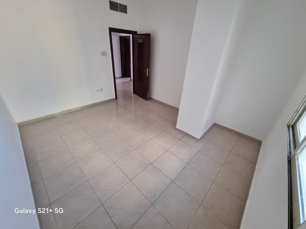 For annual rent in Sharjah, Al Qasimia area: 2 bedrooms, a living room, 2 bathrooms, and a balcony. Excellent location close to all services.