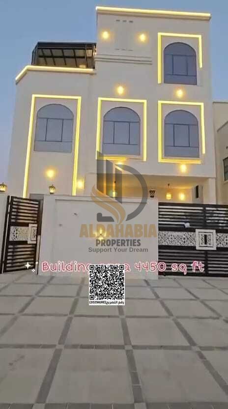 An elegant villa with a refined architectural design located in Al Amerah, featuring double stone façades and a double-front stone boundary wall, off
