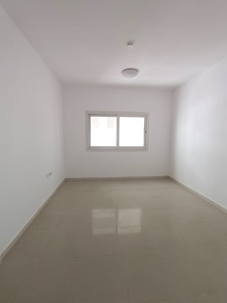 For annual rent in Sharjah, Al Taawun area: one bedroom, living room, and 2 bathrooms. Prime location, close to all services.