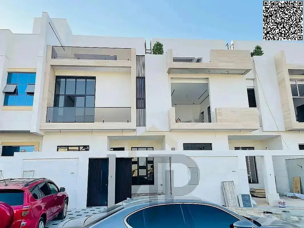 A distinctive, luxurious two-story villa with a roof, super deluxe finishing, in the Al Yasmin area, at an attractive price including registration and