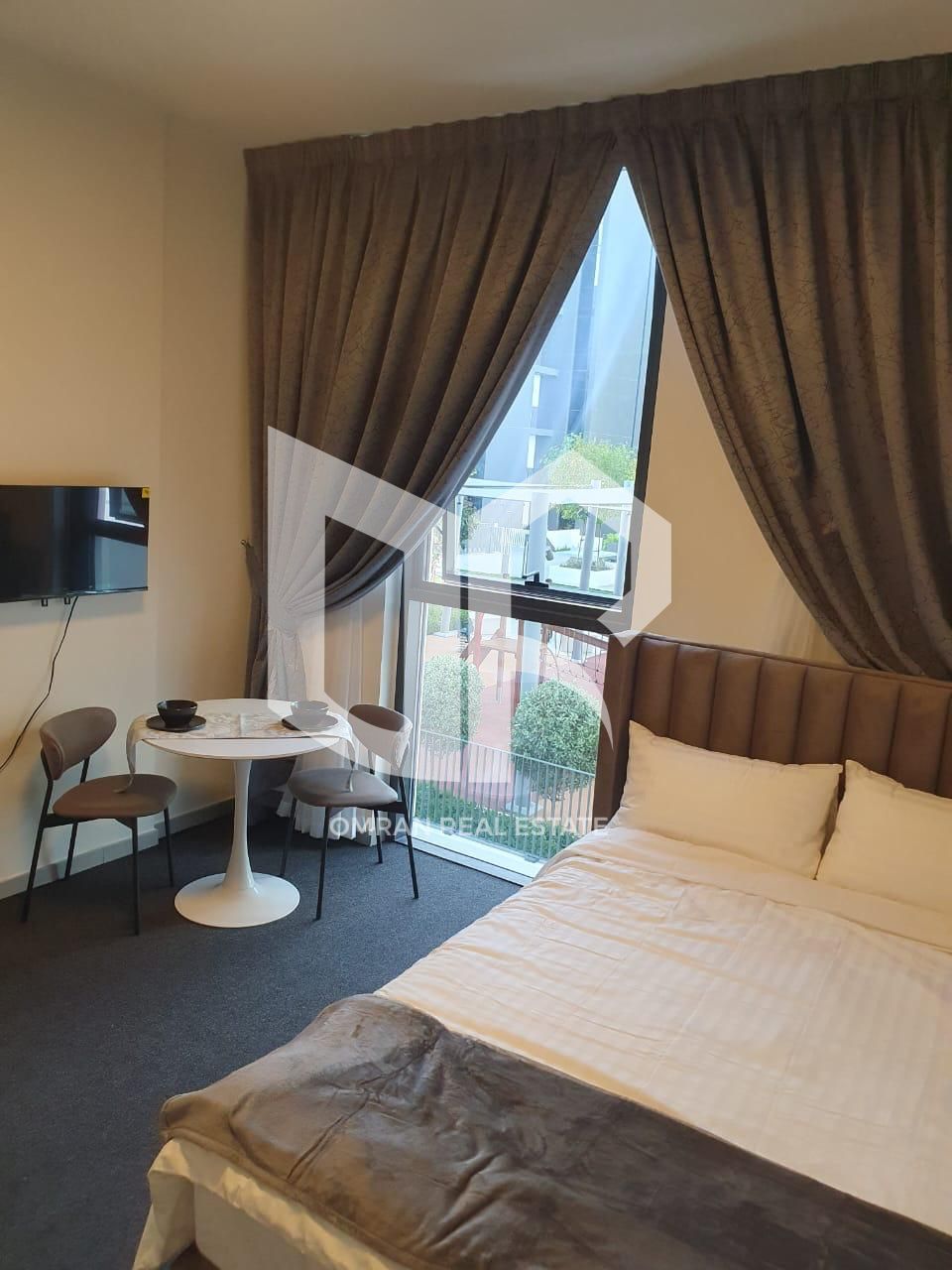 Unmissable opportunity! Furnished studio for sale in Aljada Complex - Sharjah with a great view of the pool.